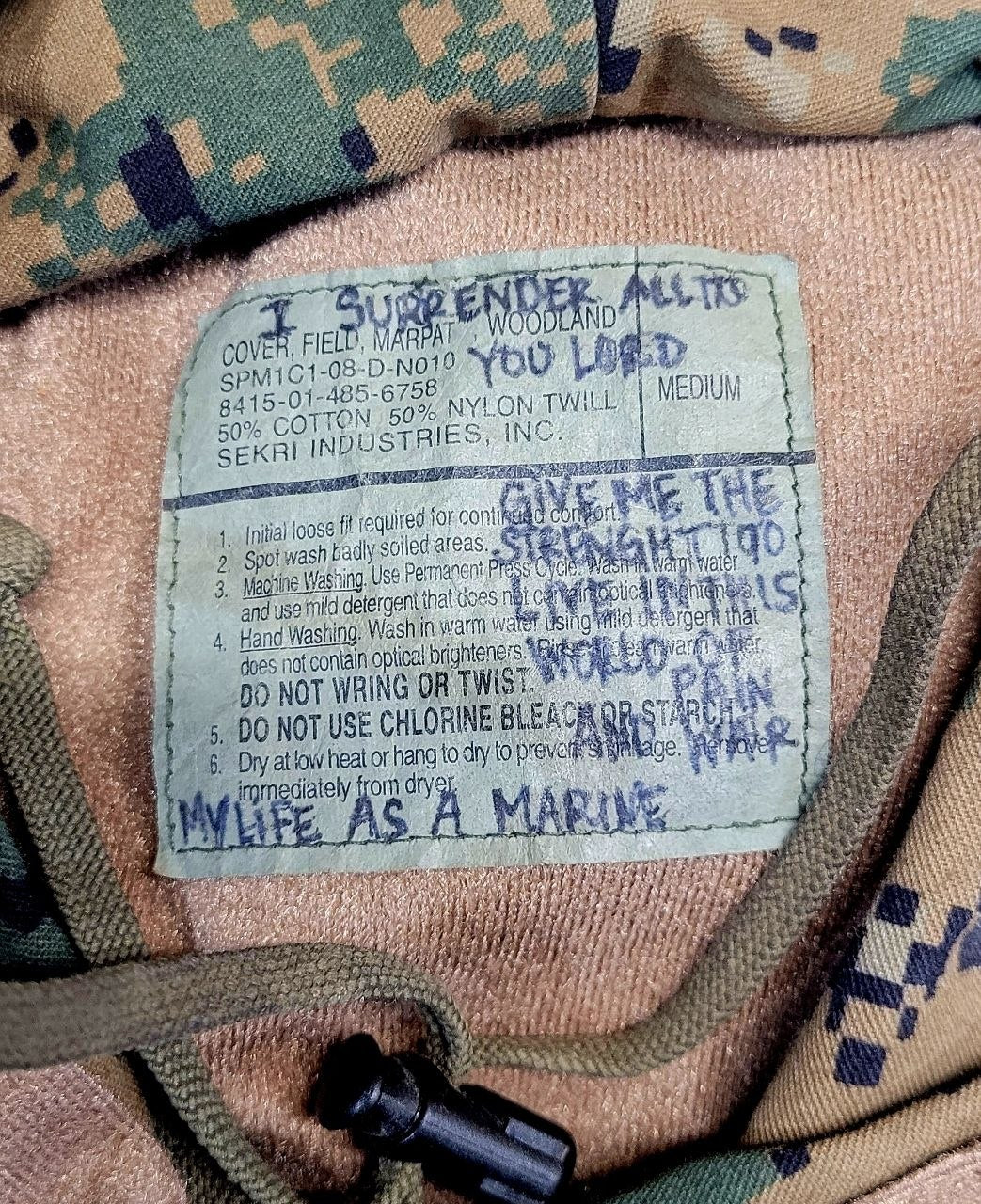 Real authentic military surplus with esoteric scribble from a real live Marine