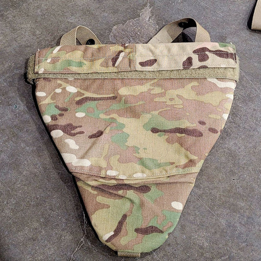 Camouflage tactical pouch on a gray surface