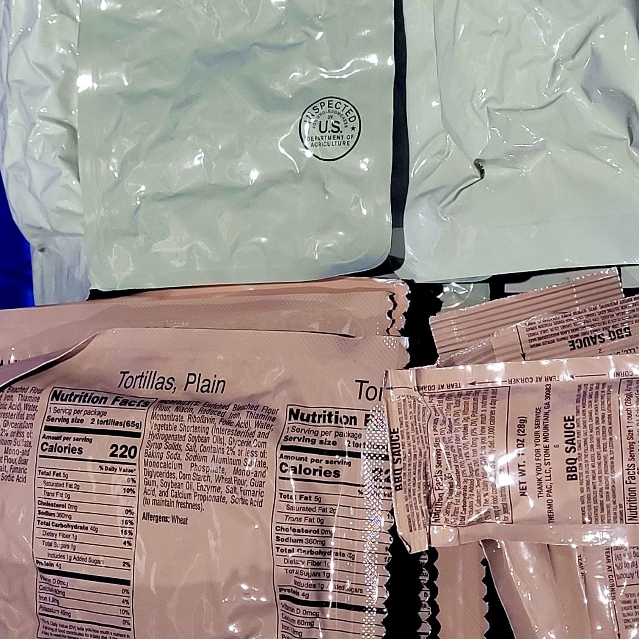 Close-up of food packaging with nutritional information and branding on a white background