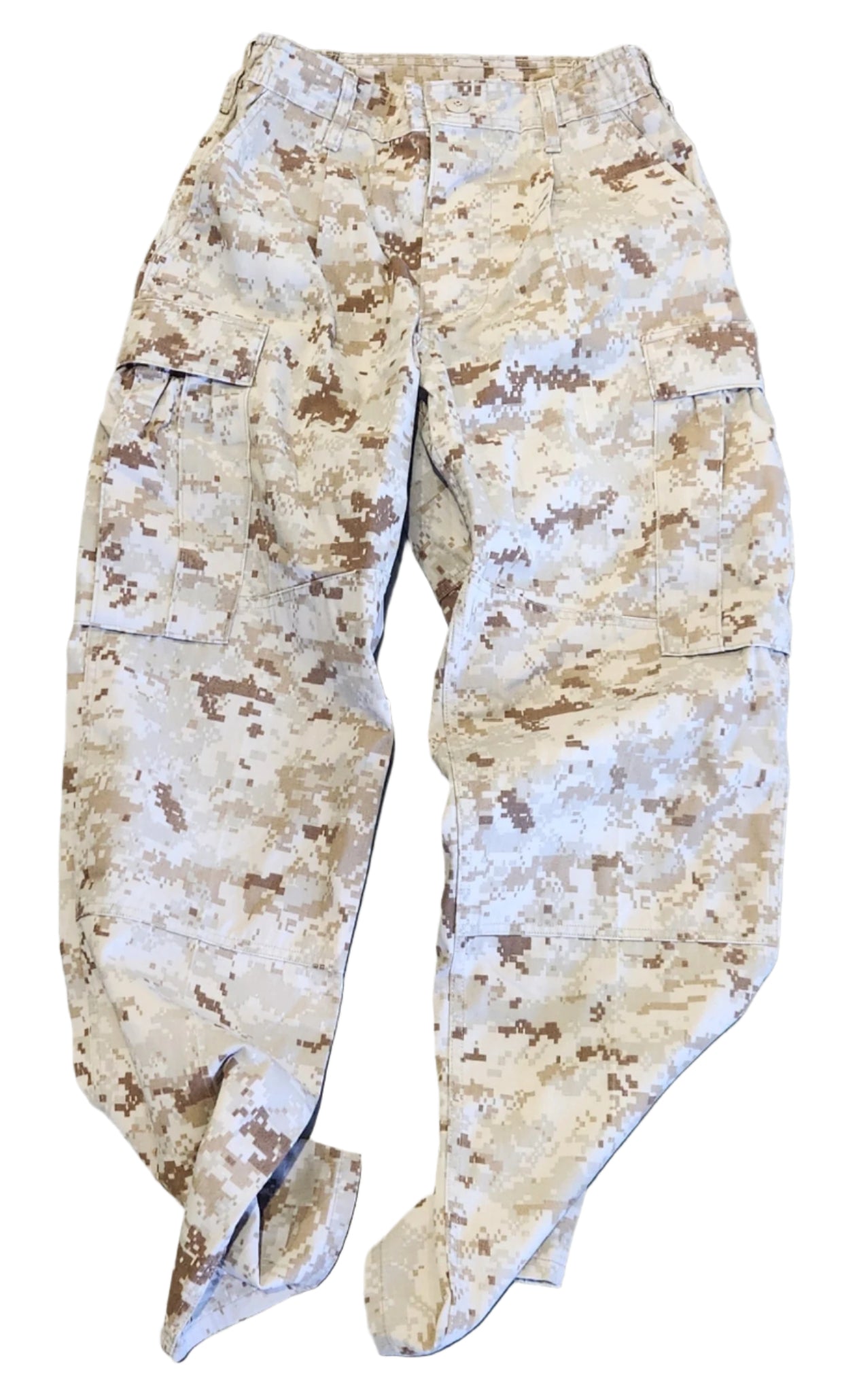 MARPAT uniform pants of a sand-color on a concrete floor.
