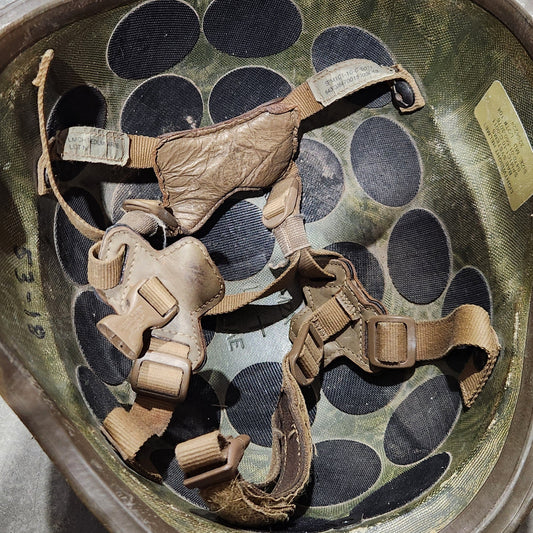Helmet interior shown with harness