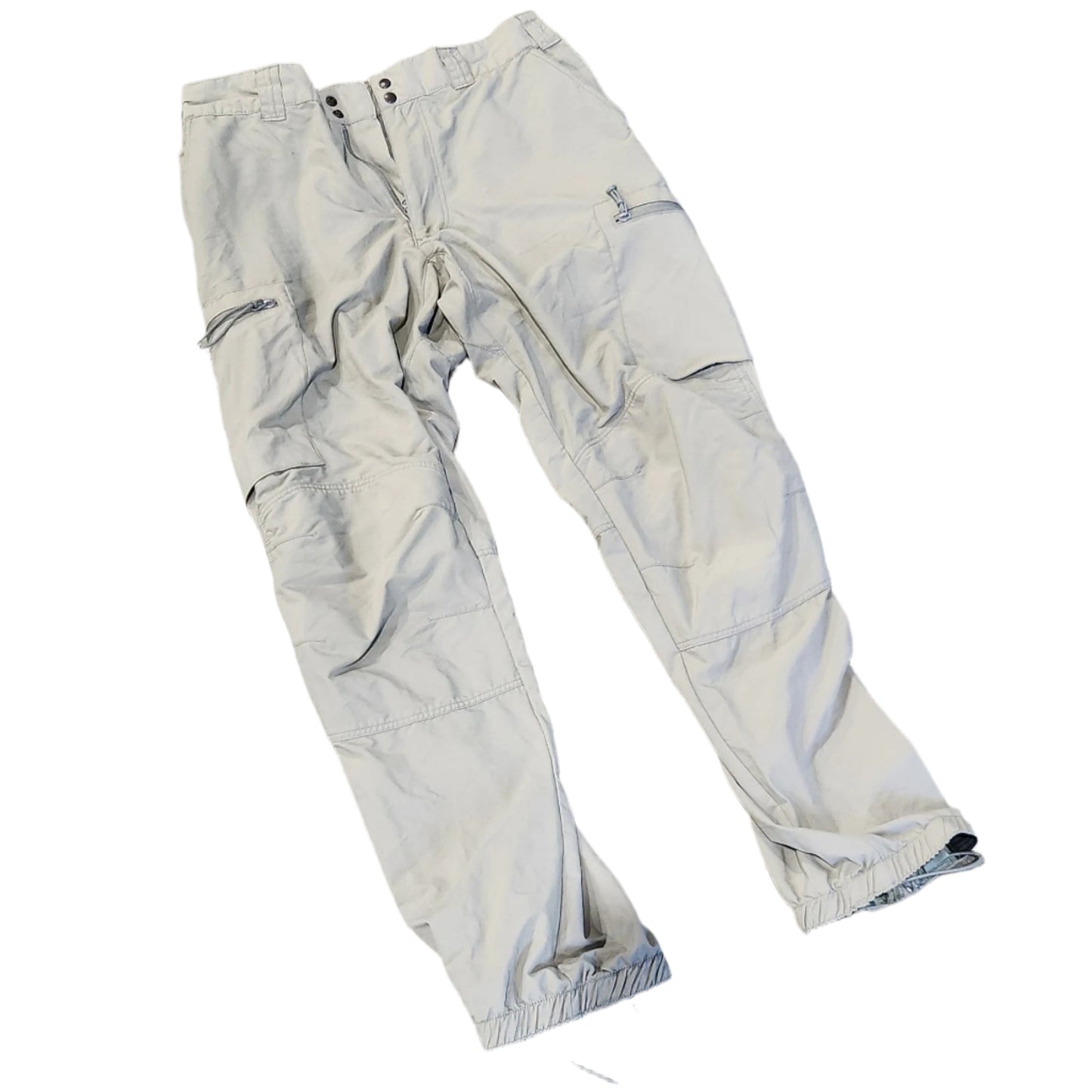 Light-colored pants on a concrete surface