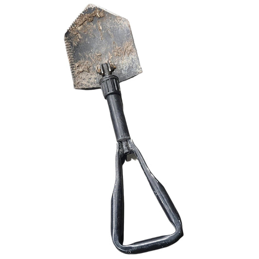 Small shovel on a concrete floor