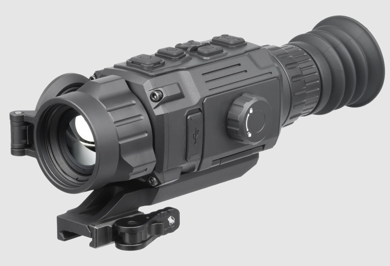 A black thermal rifle scope with a ribbed rubber eyepiece and mounting bracket, shown on a light gray background.