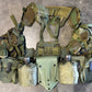 Green tactical vest with multiple pouches on a concrete floor