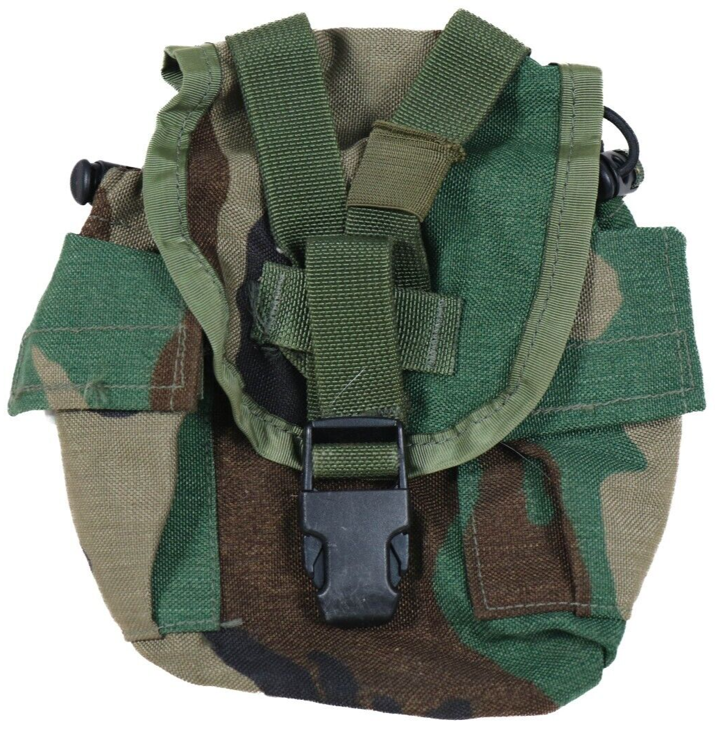 A camouflage US Military ACU MOLLE II canteen utility pouch with straps and additional pockets.