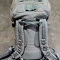 Gray backpack on a concrete surface