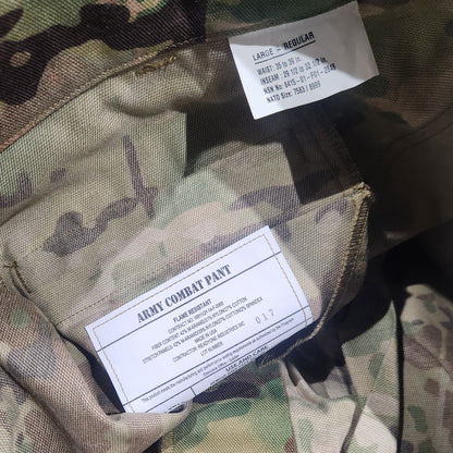 Camouflage military uniform with labels on a dark background