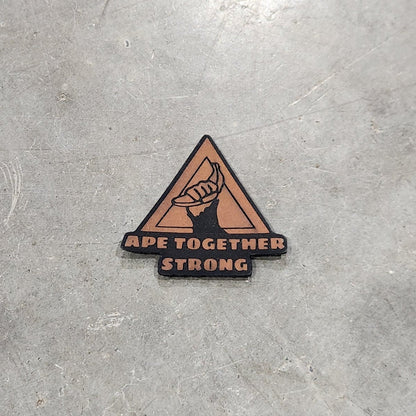 Triangular warning sign on a concrete floor