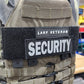 Security vest with 'LARP VETERAN' and 'SECURITY' patches on a person wearing it.
