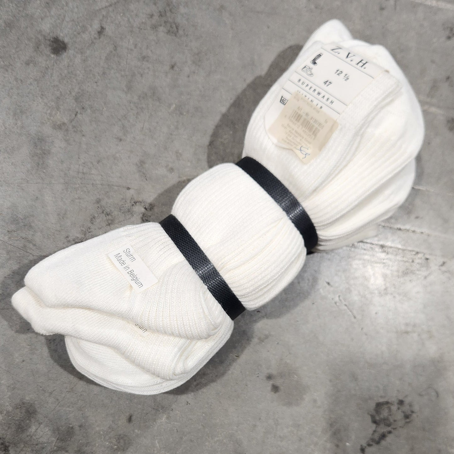 Banded socks on concrete