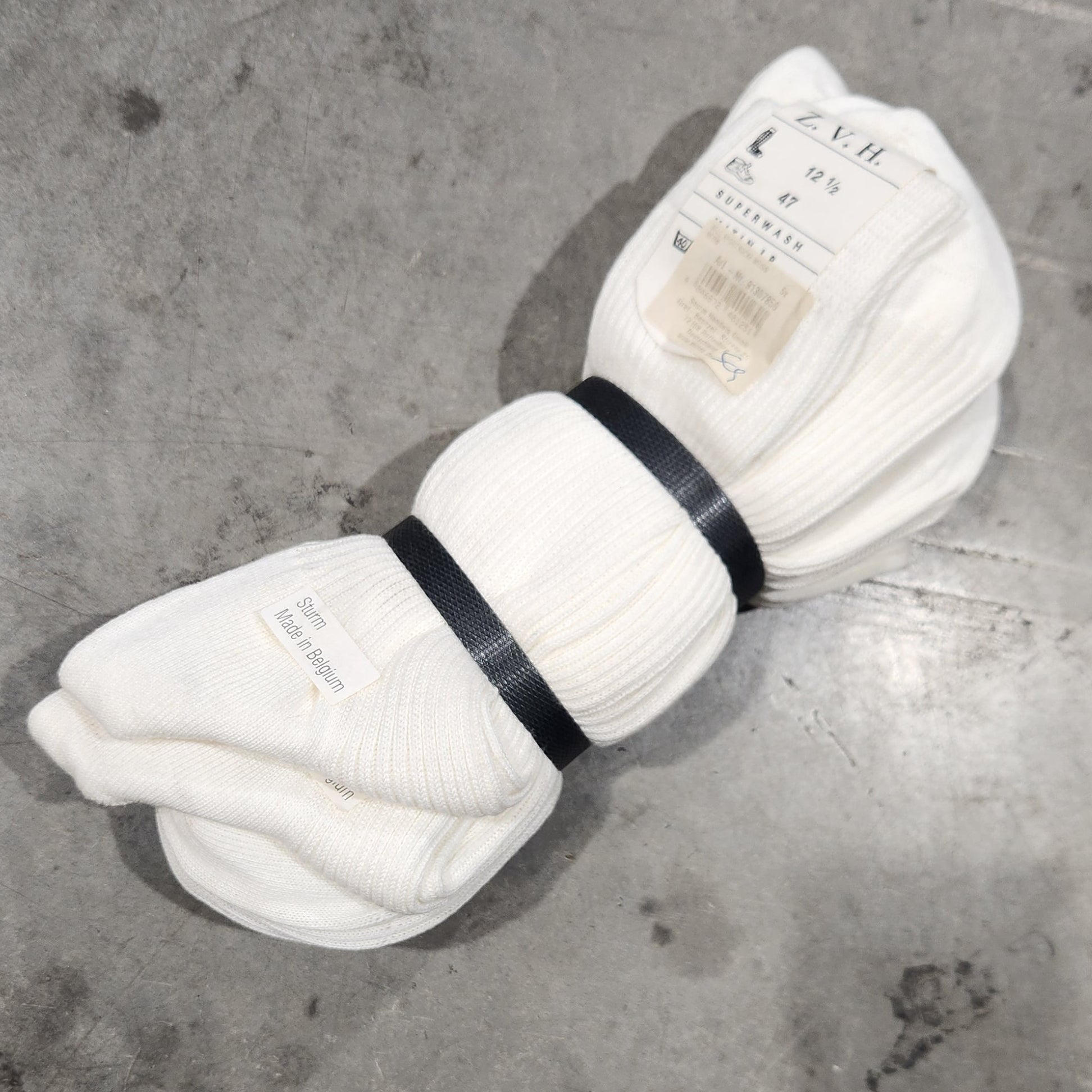 Banded socks on concrete