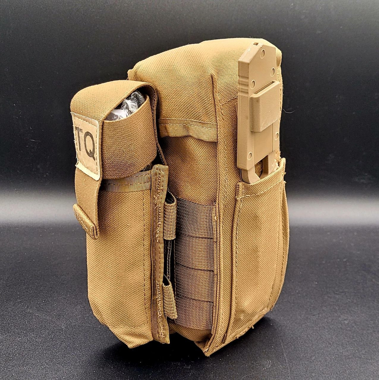 Tan tactical pouch with multiple compartments on a black background