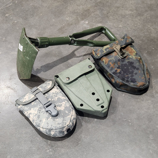 Small excavator toy on a concrete floor