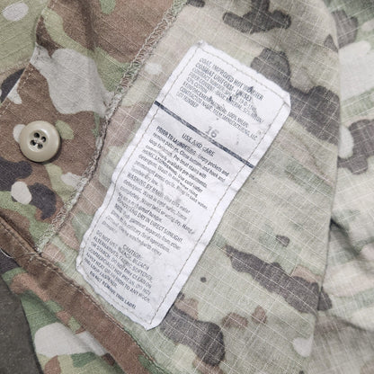 Camouflage fabric with a label on a military-style background