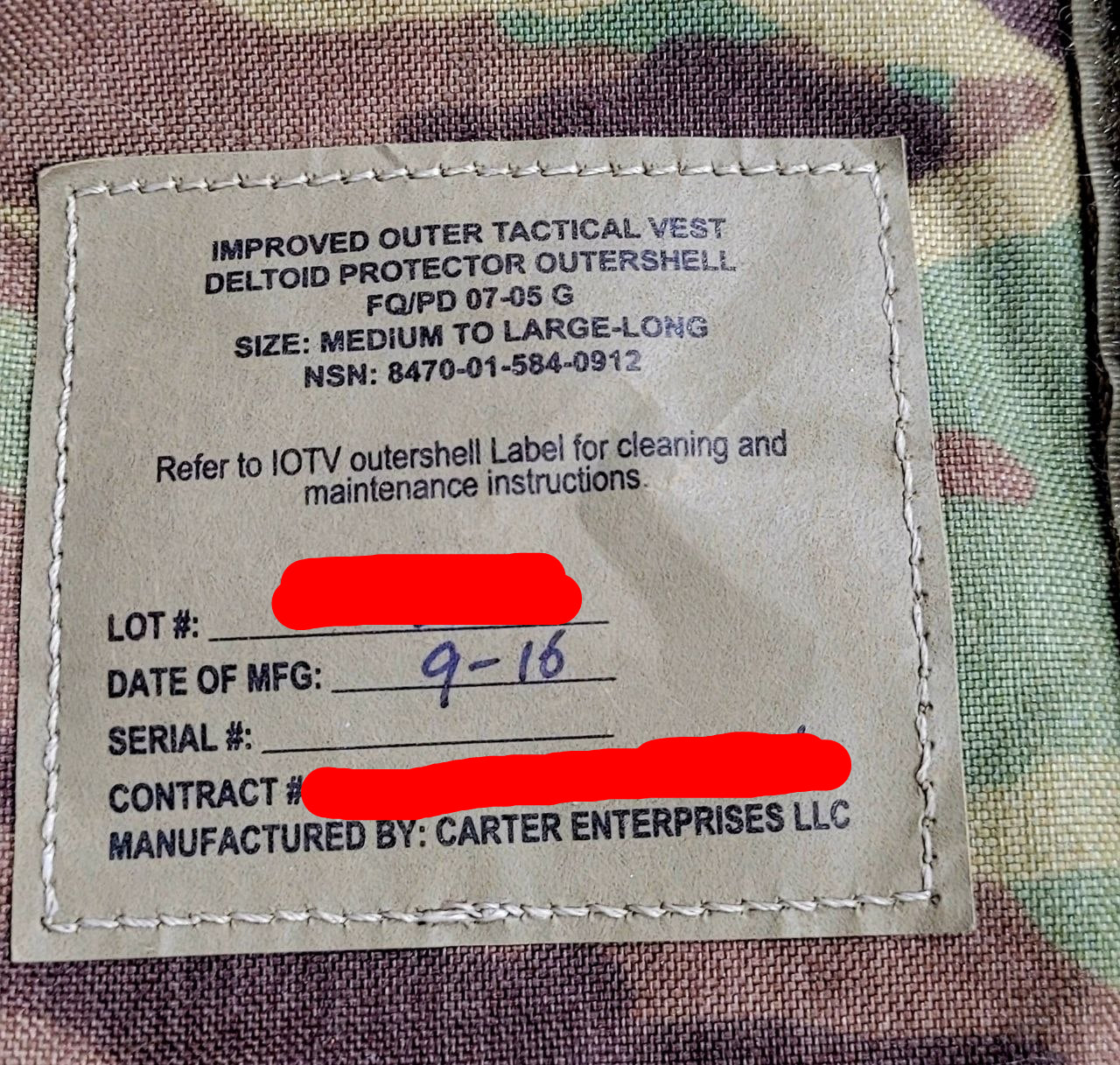 Label on a camouflage vest with text details