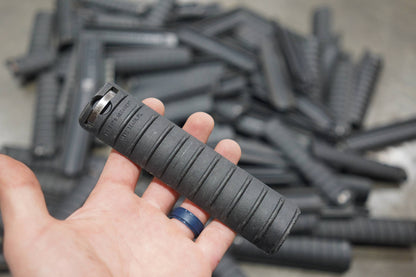 Ribbed panels for picatinny rail covers