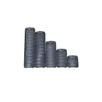 Several black rubber hose or cable rolls arranged on a concrete floor, with a cardboard box on the left and a red-and-black power tool on the right. A person's arm and hand are partially visible in the bottom-right corner, and a photographer's shadow is cast across the scene.