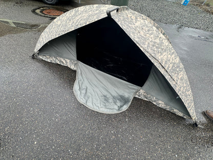 Tent deployed on gravel