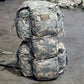 Camouflage backpack on a dark surface