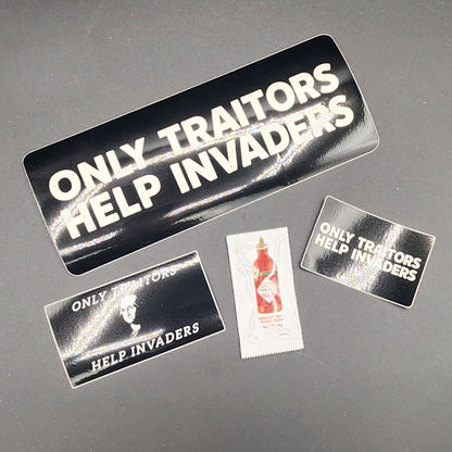 Close-up of a car's interior with 'Only Travellers' and 'O'ellly' stickers on a black surface.