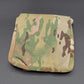 Camouflage pouch on a gray background
