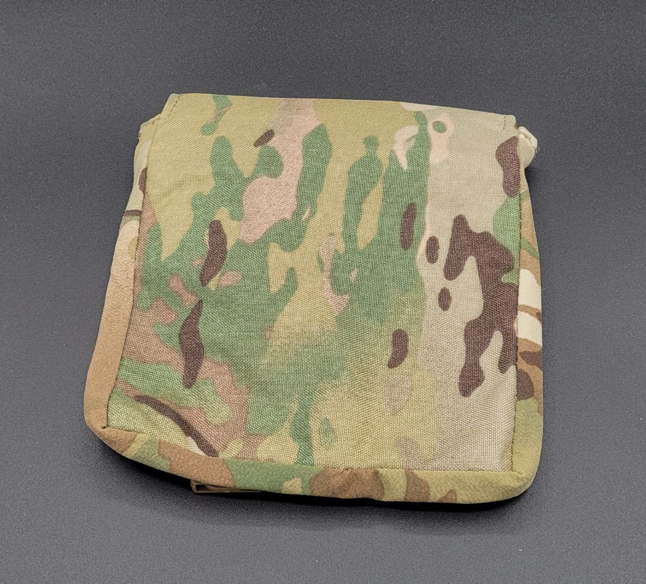 Camouflage pouch on a gray background