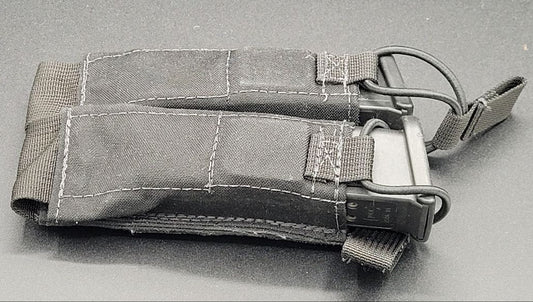  tactical magazine pouch on a gray background