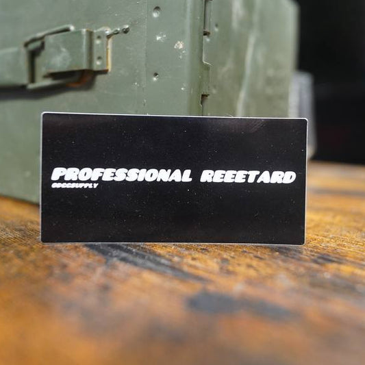 Metal box with a 'Professional Rezervard' label on a wooden surface