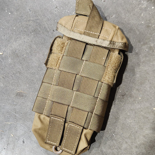 Molle pouch on a gray surface