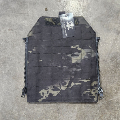 Camouflage pouch with a brand tag on a concrete floor