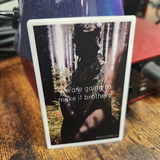 Playing card with text and images on a wooden surface